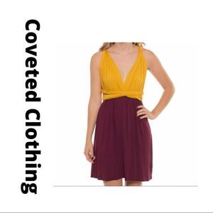 Coveted Clothing Halter Mini Dress.